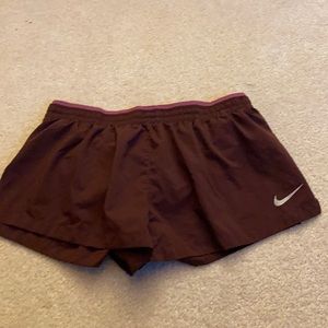Maroon Nike shorts